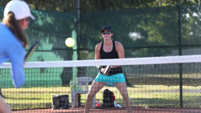 ladies playing pickleball